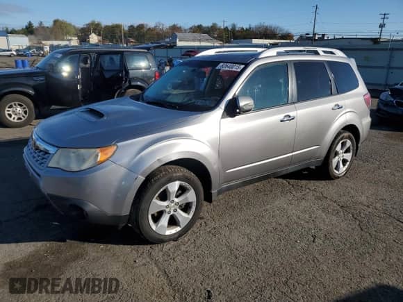 2011 Subaru Forester XT Touring z VIN JF2SHGGC6BH703232, wystawiony jako Copart lot #82640015 z przebiegiem 154 621 mil mil oraz Czysty tytuł • Clean title. Historia ofert i sprzedaży dostępna na DreamBid. Obrazek 1.
