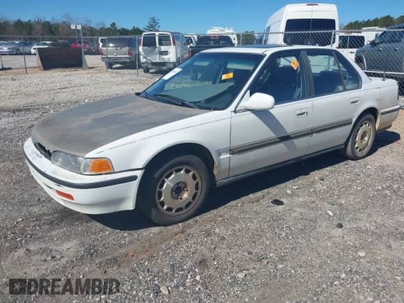 1992 Honda Accord LX z VIN JHMCB7659NC048944, wystawiony jako IAAI lot #41704471 z przebiegiem 253 535 mil mil oraz . Historia ofert i sprzedaży dostępna na DreamBid. Obrazek 2.