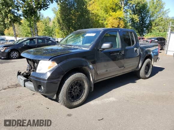 2007 Nissan Frontier LE with VIN 1N6AD07W37C447043, listed as a Copart auction lot 75016144 with 169,901 mi miles and Salvage title. Bid and sale history available at DreamBid. Image 1.