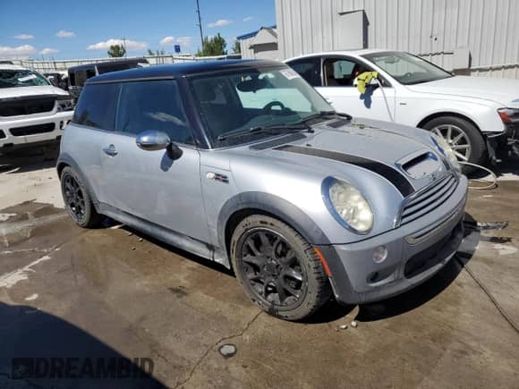 2006 MINI Hardtop S with VIN WMWRE33586TJ37385, listed as a Copart auction lot 67606184 with 78,671 mi miles and Salvage title. Bid and sale history available at DreamBid. Image 4.