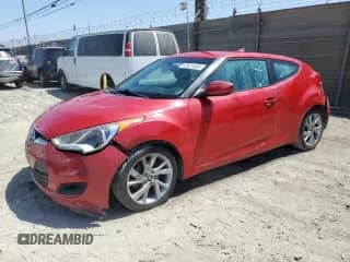 2016 Hyundai Veloster z VIN KMHTC6AD8GU274831, wystawiony jako Copart lot #63621555 z przebiegiem 116 370 mil mil oraz Szkoda całkowita • Salvage title. Historia ofert i sprzedaży dostępna na DreamBid. Obrazek 1.