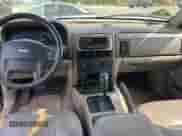 2004 Jeep Grand Cherokee Laredo z VIN 1J4GX48N24C436753, wystawiony jako Copart lot #48782585 z przebiegiem 114 035 mil mil oraz Czysty tytuł • Clean title. Historia ofert i sprzedaży dostępna na DreamBid. Obrazek 9.