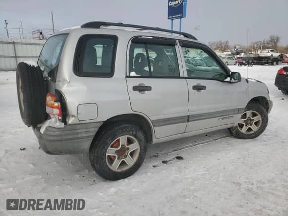 2003 Chevrolet Tracker with VIN 2CNBJ13C836929720, listed as a Copart auction lot 88545235 with 175,320 mi miles and Salvage title. Bid and sale history available at DreamBid. Image 3.