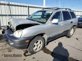 2002 Hyundai Santa Fe GLS z VIN KM8SC13D02U311312, wystawiony jako Copart lot #85943534 z przebiegiem 307 758 mil mil oraz Szkoda całkowita • Salvage title. Historia ofert i sprzedaży dostępna na DreamBid. Obrazek 1.