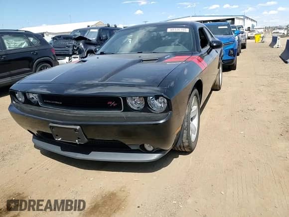 2012 Dodge Challenger R/T z VIN 2C3CDYBT5CH144395, wystawiony jako Copart lot #60336105 z przebiegiem 58 920 mil mil oraz Szkoda całkowita • Salvage title. Historia ofert i sprzedaży dostępna na DreamBid. Obrazek 13.
