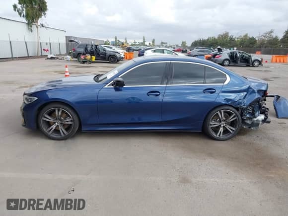 2021 BMW 3 Series 330i с VIN 3MW5R1J09M8B86677, выставлен на аукционе IAAI как лот 43432487 с пробегом 74 515 миль миль и . История ставок и продаж доступна на DreamBid. Изображение 15.