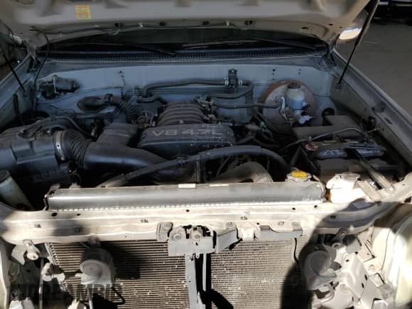 2005 Toyota Tundra SR5 z VIN 5TBRT34105S456421, wystawiony jako Copart lot #81968065 z przebiegiem 199 229 mil mil oraz Szkoda całkowita • Salvage title. Historia ofert i sprzedaży dostępna na DreamBid. Obrazek 11.