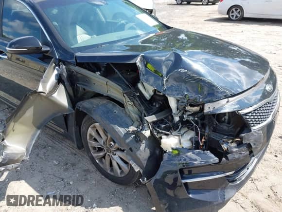 2016 Kia Optima EX z VIN 5XXGU4L34GG053308, wystawiony jako IAAI lot #42446166 z przebiegiem 127 971 mil mil oraz . Historia ofert i sprzedaży dostępna na DreamBid. Obrazek 6.