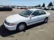 1997 Honda Accord LX with VIN 1HGCD5634VA244155, listed as a Copart auction lot 70736475 with 239,580 mi miles and Salvage title. Bid and sale history available at DreamBid. Image 1.