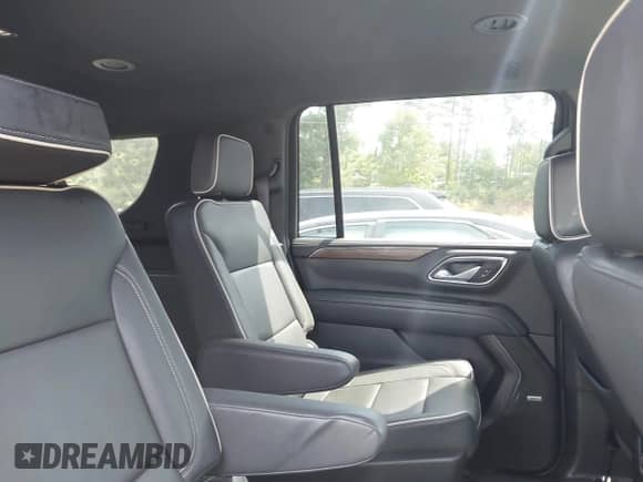 2023 Chevrolet Suburban Premier with VIN 1GNSCFKD9PR547445, listed as a IAAI auction lot 43092390 with 42,878 mi miles and . Bid and sale history available at DreamBid. Image 8.