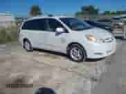 2006 Toyota Sienna XLE z VIN 5TDZA22C16S559859, wystawiony jako IAAI lot #43476816 z przebiegiem 87 250 mil mil oraz . Historia ofert i sprzedaży dostępna na DreamBid. Obrazek 1.