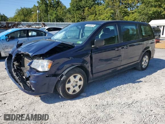 2013 Dodge Grand Caravan SE with VIN 2C4RDGBG7DR712614, listed as a Copart auction lot 80000875 with 74,660 mi miles and Salvage title. Bid and sale history available at DreamBid. Image 1.