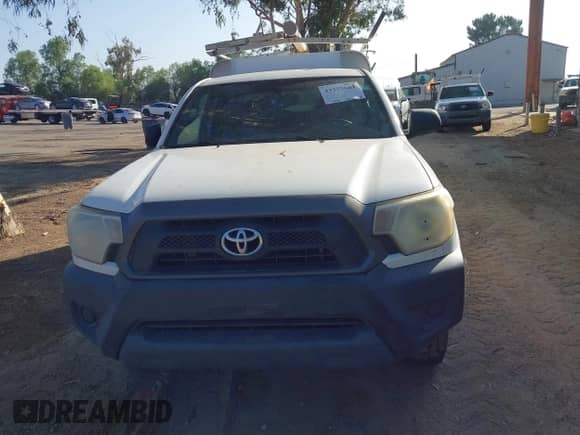2014 Toyota Tacoma with VIN 5TFNX4CN7EX033818, listed as a IAAI auction lot 43373603 with 130,724 mi miles and . Bid and sale history available at DreamBid. Image 12.