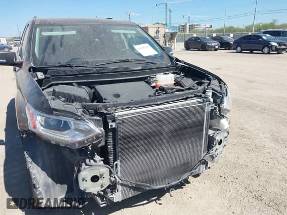 2019 Chevrolet Traverse LT z VIN 1GNERHKW0KJ115178, wystawiony jako IAAI lot #43457510 z przebiegiem 127 984 mil mil oraz . Historia ofert i sprzedaży dostępna na DreamBid. Obrazek 6.