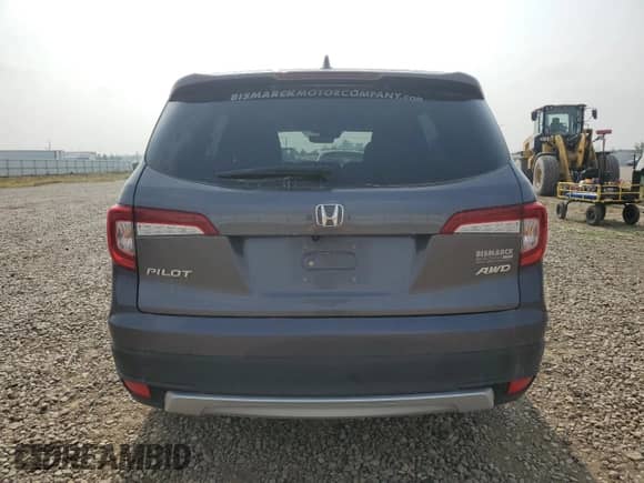 2020 Honda Pilot EX-L z VIN 5FNYF6H52LB007428, wystawiony jako Copart lot #71036745 z przebiegiem 84 257 mil mil oraz Szkoda całkowita • Salvage title. Historia ofert i sprzedaży dostępna na DreamBid. Obrazek 6.