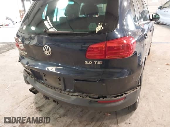 2014 Volkswagen Tiguan SEL with VIN WVGAV3AX8EW563008, listed as a IAAI auction lot 41356523 with 138,211 mi miles and . Bid and sale history available at DreamBid. Image 20.