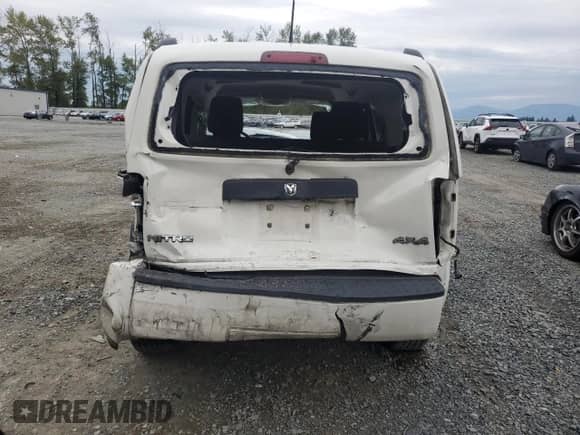 2008 Dodge Nitro SXT with VIN 1D8GU28K98W280841, listed as a Copart auction lot 69229534 with 136,475 mi miles and Salvage title. Bid and sale history available at DreamBid. Image 6.