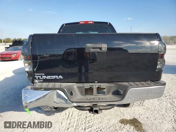 2012 Toyota Tundra z VIN 5TFRU5F15CX026419, wystawiony jako Copart lot #85980334 z przebiegiem 150 239 mil mil oraz Szkoda całkowita • Salvage title. Historia ofert i sprzedaży dostępna na DreamBid. Obrazek 6.