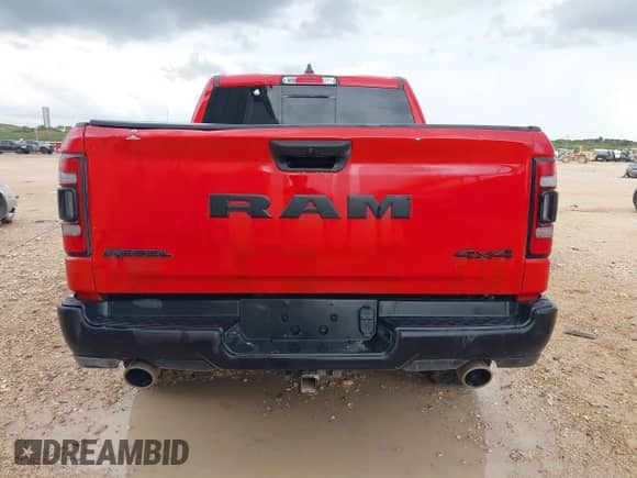 2022 Ram 1500 Rebel z VIN 1C6SRFLTXNN362961, wystawiony jako IAAI lot #42605488 z przebiegiem 121 529 mil mil oraz . Historia ofert i sprzedaży dostępna na DreamBid. Obrazek 16.