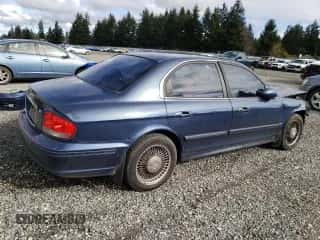 2002 Hyundai Sonata z VIN KMHWF25S12A520554, wystawiony jako Copart lot #43483194 z przebiegiem 131 409 mil mil oraz Szkoda całkowita • Salvage title. Historia ofert i sprzedaży dostępna na DreamBid. Obrazek 3.