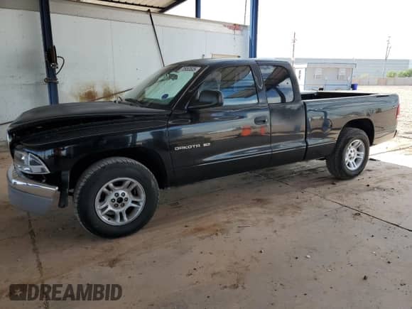 2001 Dodge Dakota с VIN 1B7GL22X61S307352, выставлен на аукционе Copart как лот 70953535 с пробегом 124 413 миль миль и Списание • Salvage title. История ставок и продаж доступна на DreamBid. Изображение 1.