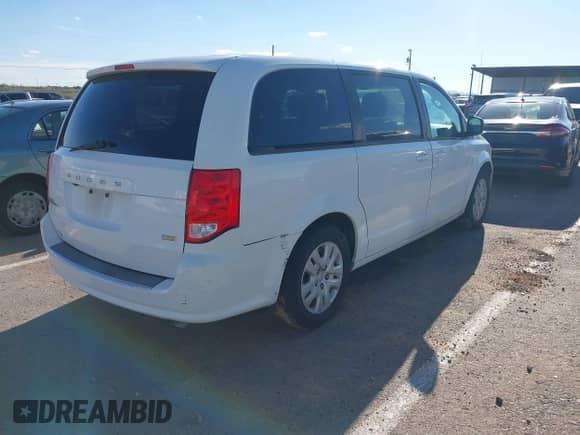2018 Dodge Grand Caravan SE Plus with VIN 2C4RDGBG3JR176188, listed as a IAAI auction lot 43261161 with 240,463 mi miles and . Bid and sale history available at DreamBid. Image 4.
