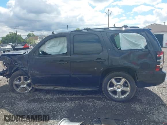 2011 Chevrolet Tahoe LT z VIN 1GNSKBE04BR367755, wystawiony jako IAAI lot #43109754 z przebiegiem 193 501 mil mil oraz . Historia ofert i sprzedaży dostępna na DreamBid. Obrazek 15.