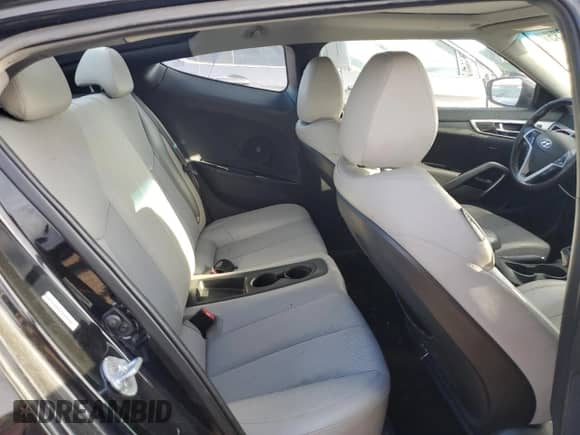 2013 Hyundai Veloster w/Black Int z VIN KMHTC6AD4DU096489, wystawiony jako Copart lot #82087835 z przebiegiem 110 897 mil mil oraz Czysty tytuł • Clean title. Historia ofert i sprzedaży dostępna na DreamBid. Obrazek 10.