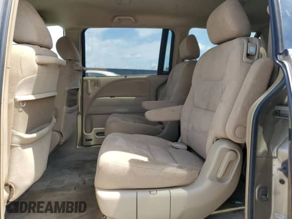 2006 Honda Odyssey EX z VIN 5FNRL38446B439803, wystawiony jako Copart lot #58628095 z przebiegiem 198 483 mil mil oraz Szkoda całkowita • Salvage title. Historia ofert i sprzedaży dostępna na DreamBid. Obrazek 11.