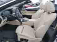 2022 BMW 4 Series 430i with VIN WBA23AT03NCJ32884, listed as a Copart auction lot 48077065 with 12,910 mi miles and Salvage title. Bid and sale history available at DreamBid. Image 7.