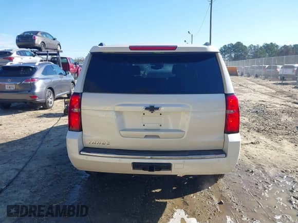 2015 Chevrolet Tahoe LTZ with VIN 1GNSCCKC3FR308607, listed as a IAAI auction lot 41799983 with 191,919 mi miles and . Bid and sale history available at DreamBid. Image 16.