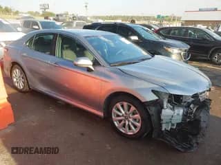 2019 Toyota Camry SE z VIN 4T1B11HK2KU693548, wystawiony jako IAAI lot #43352154 z przebiegiem 64 472 mil mil oraz . Historia ofert i sprzedaży dostępna na DreamBid. Obrazek 1.