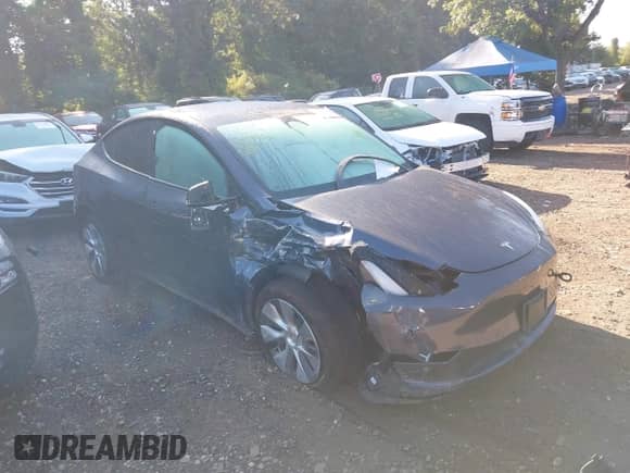 2023 Tesla Model Y Long Range with VIN 7SAYGDEE6PA098084, listed as a IAAI auction lot 43095726 with 30,506 mi miles and . Bid and sale history available at DreamBid. Image 1.