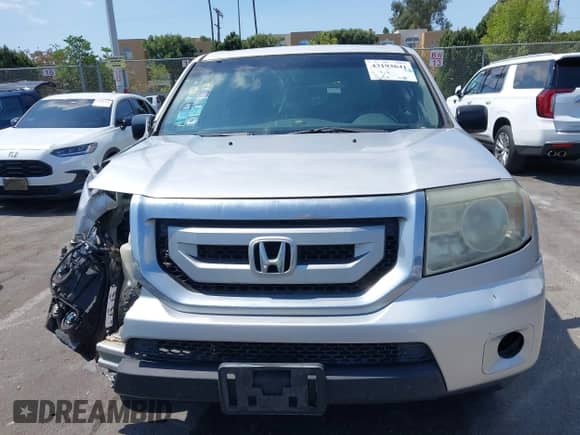 2009 Honda Pilot LX with VIN 5FNYF38219B025285, listed as a IAAI auction lot 43193641 with 120,873 mi miles and . Bid and sale history available at DreamBid. Image 11.