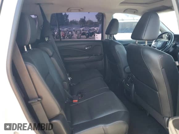 2021 Honda Pilot Special Edition z VIN 5FNYF5H22MB006975, wystawiony jako Copart lot #70180205 z przebiegiem 63 174 mil mil oraz Szkoda całkowita • Salvage title. Historia ofert i sprzedaży dostępna na DreamBid. Obrazek 11.