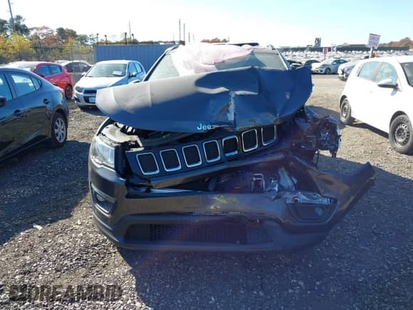 2021 Jeep Compass Latitude with VIN 3C4NJDBB8MT537958, listed as a IAAI auction lot 40705924 with 73,319 mi miles and . Bid and sale history available at DreamBid. Image 13.