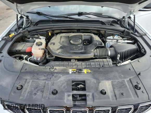 2021 Jeep Grand Cherokee Overland with VIN 1C4RJKDG5M8129138, listed as a Copart auction lot 60733455 with 57,027 mi miles and Salvage title. Bid and sale history available at DreamBid. Image 12.