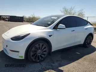 2023 Tesla Model Y Performance z VIN 7SAYGDEF2PF757905, wystawiony jako Copart lot #65742795 z przebiegiem 28 927 mil mil oraz Szkoda całkowita • Salvage title. Historia ofert i sprzedaży dostępna na DreamBid. Obrazek 1.