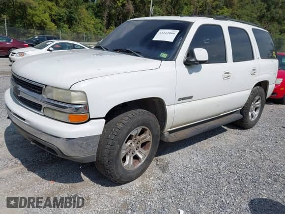 2002 Chevrolet Tahoe LT z VIN 1GNEK13Z42J197579, wystawiony jako IAAI lot #43212866 z przebiegiem 313 693 mil mil oraz . Historia ofert i sprzedaży dostępna na DreamBid. Obrazek 2.