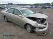 2005 Toyota Camry XLE with VIN 4T1BF30K55U106627, listed as a IAAI auction lot 43237399 with 216,571 mi miles and . Bid and sale history available at DreamBid. Image 1.