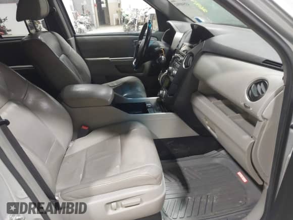 2012 Honda Pilot Touring with VIN 5FNYF4H90CB034523, listed as a IAAI auction lot 43540902 with 269,702 mi miles and . Bid and sale history available at DreamBid. Image 5.