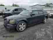 2005 Dodge Magnum SXT with VIN 2D4GZ48V85H576310, listed as a Copart auction lot 61059975 with 175,541 mi miles and Salvage title. Bid and sale history available at DreamBid. Image 1.