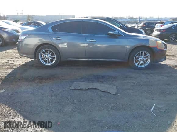 2014 Nissan Maxima SV z VIN 1N4AA5AP4EC488147, wystawiony jako IAAI lot #41165771 z przebiegiem 44 113 mil mil oraz . Historia ofert i sprzedaży dostępna na DreamBid. Obrazek 5.