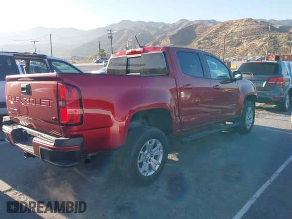 2021 Chevrolet Colorado 2WD LT with VIN 1GCGSCEN7M1158415, listed as a IAAI auction lot 42980099 with 52,481 mi miles and . Bid and sale history available at DreamBid. Image 14.