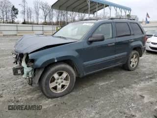 2005 Jeep Grand Cherokee Laredo with VIN 1J4HS48N85C545447, listed as a Copart auction lot 70114595 with 208,556 mi miles and Salvage title. Bid and sale history available at DreamBid. Image 1.
