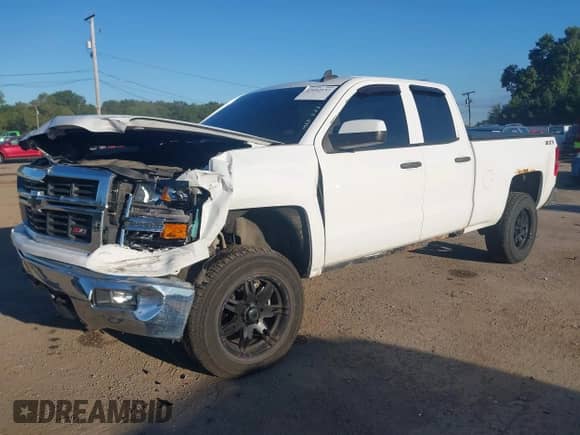 2015 Chevrolet Silverado 1500 LT z VIN 1GCVKREC1FZ362348, wystawiony jako IAAI lot #43092157 z przebiegiem 140 941 mil mil oraz . Historia ofert i sprzedaży dostępna na DreamBid. Obrazek 17.