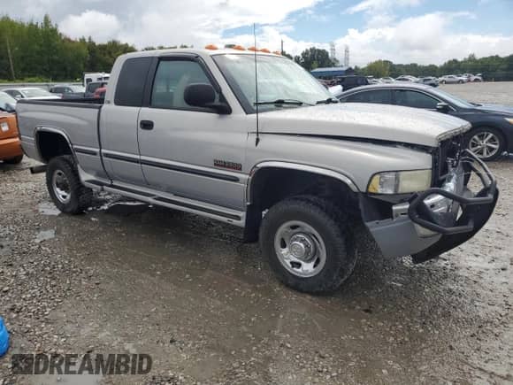 1999 Dodge 2500 with VIN 1B7KF2369XJ516946, listed as a Copart auction lot 84019525 with 178,308 mi miles and Salvage title. Bid and sale history available at DreamBid. Image 4.