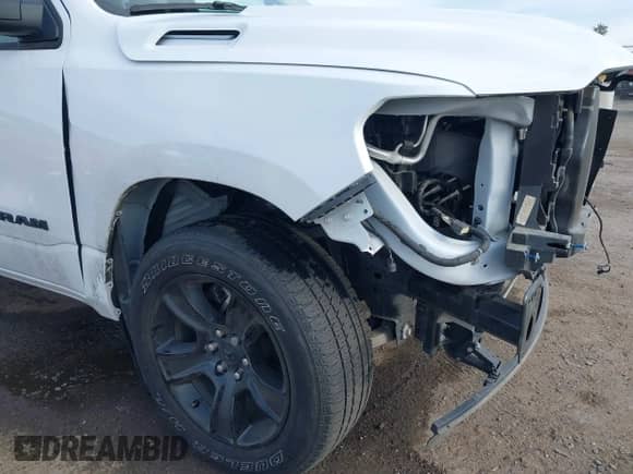2023 Ram 1500 Lone Star z VIN 1C6RREBT8PN553095, wystawiony jako IAAI lot #41647688 z przebiegiem 18 574 mil mil oraz . Historia ofert i sprzedaży dostępna na DreamBid. Obrazek 19.