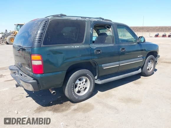 2003 Chevrolet Tahoe LS with VIN 1GNEC13V53J238250, listed as a IAAI auction lot 42920786 with 183,316 mi miles and . Bid and sale history available at DreamBid. Image 4.