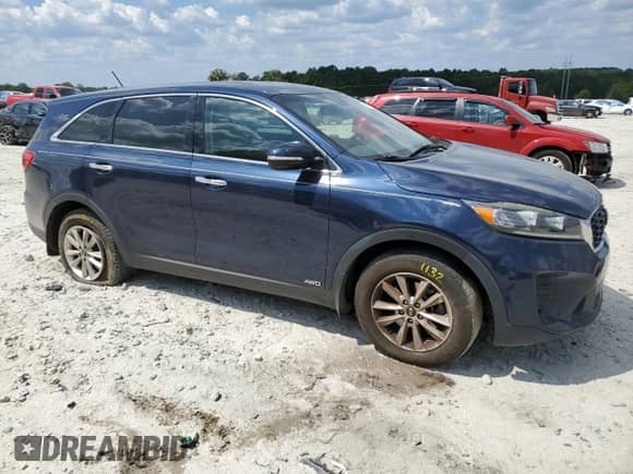 2019 Kia Sorento LX z VIN 5XYPGDA32KG480498, wystawiony jako Copart lot #80701565 z przebiegiem 145 207 mil mil oraz Szkoda całkowita • Salvage title. Historia ofert i sprzedaży dostępna na DreamBid. Obrazek 4.